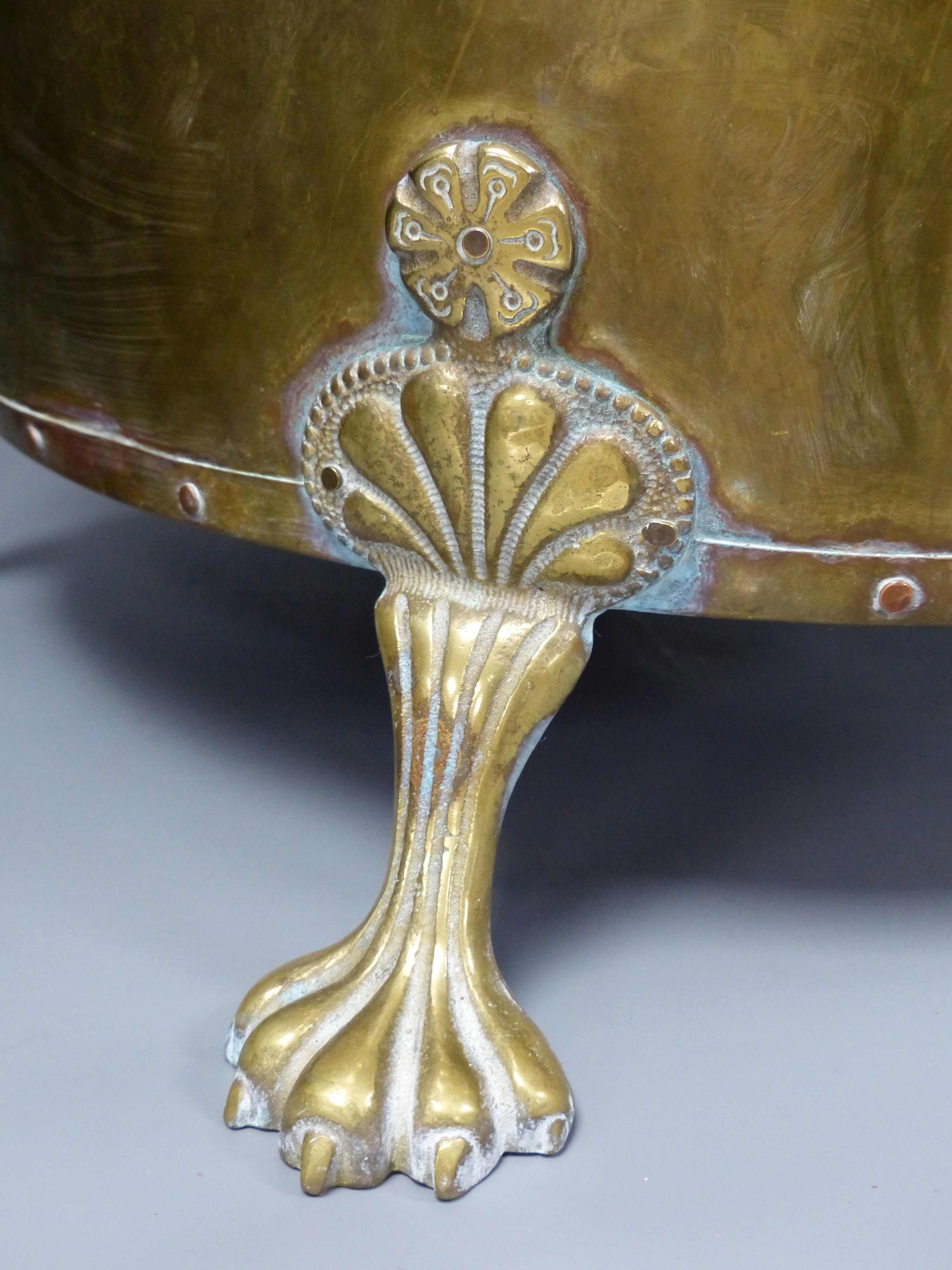 A planished brass wine cooler or jardiniere, approximate length 45cm